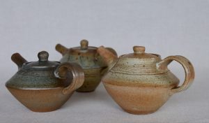 Various Ceramic teapots made by David Collins