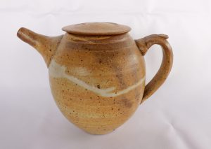 A Pottery Teapot with a oatmeal glaze created by David Collins
